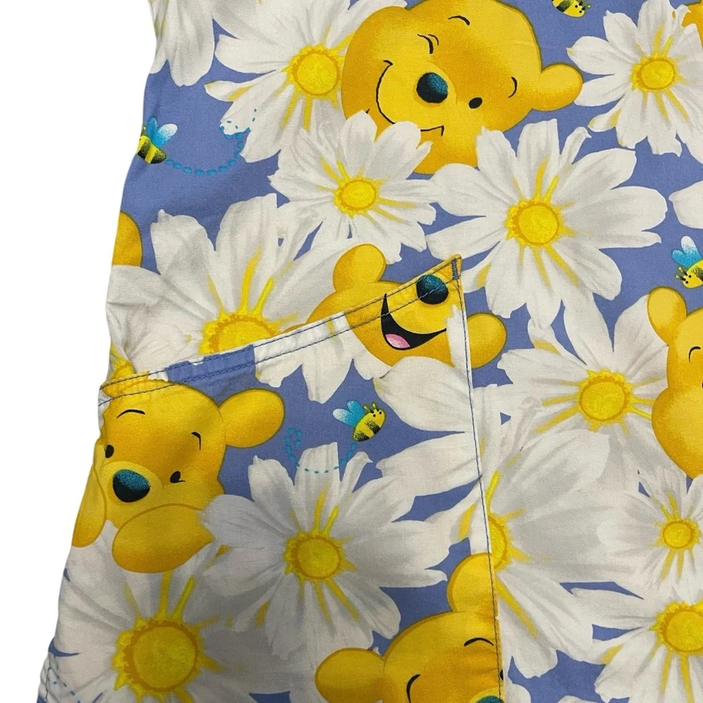 Disney Blue and Yellow Floral Print Adult Woman’s Scrub.
Size S - Picture 3 of 13